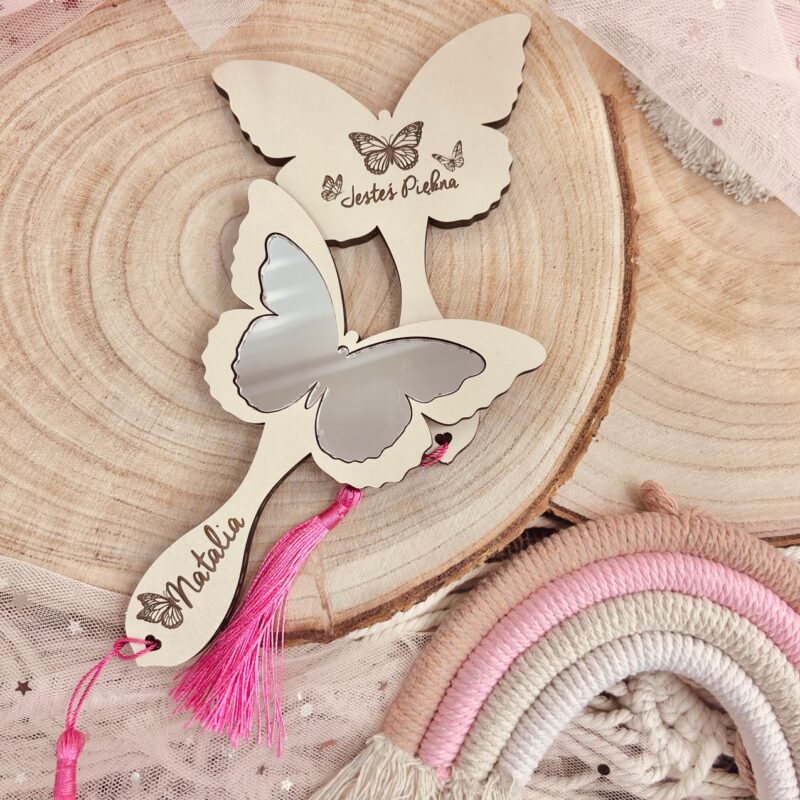 lo1s Kremowe lusterko w kształcie motylka z różowym frędzelkiem